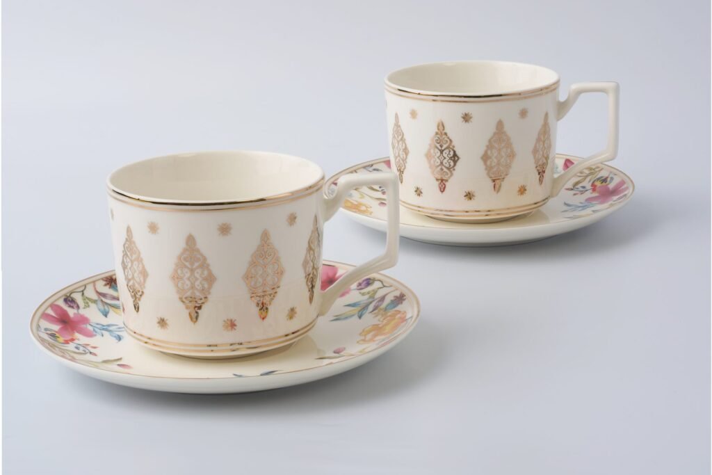 A pair of Casa Aseana teacups and saucers from the Royal Songket Collection