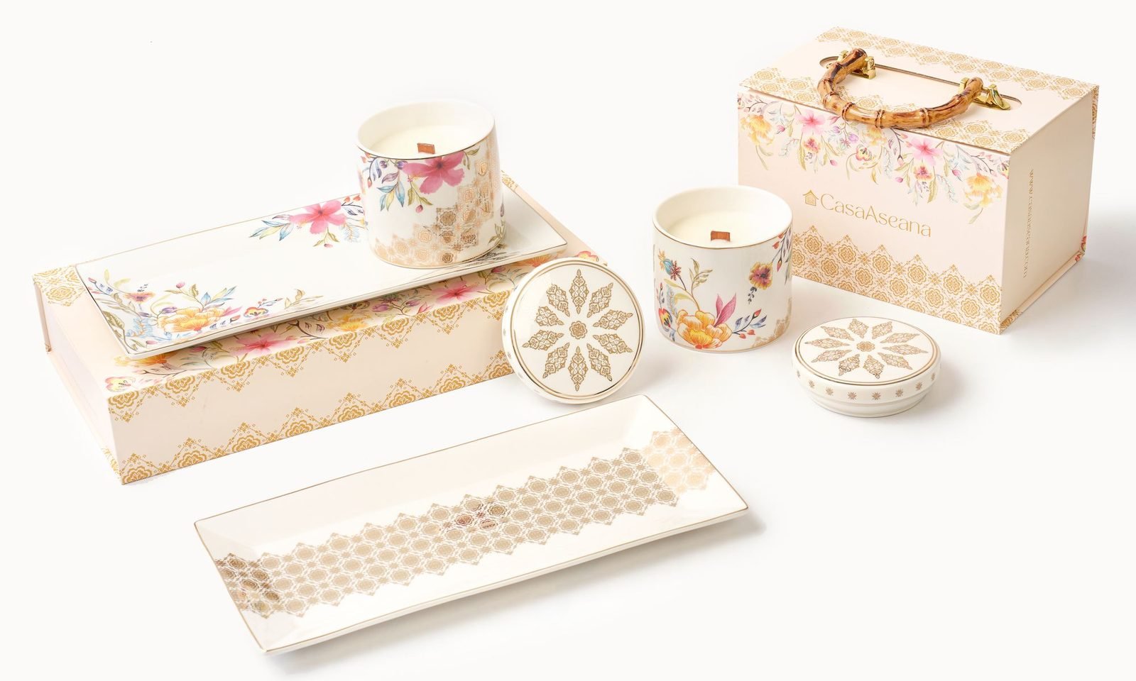 Casa Aseana fine porcelain candle jars and rectangular plates beside Casa Aseana gift boxes