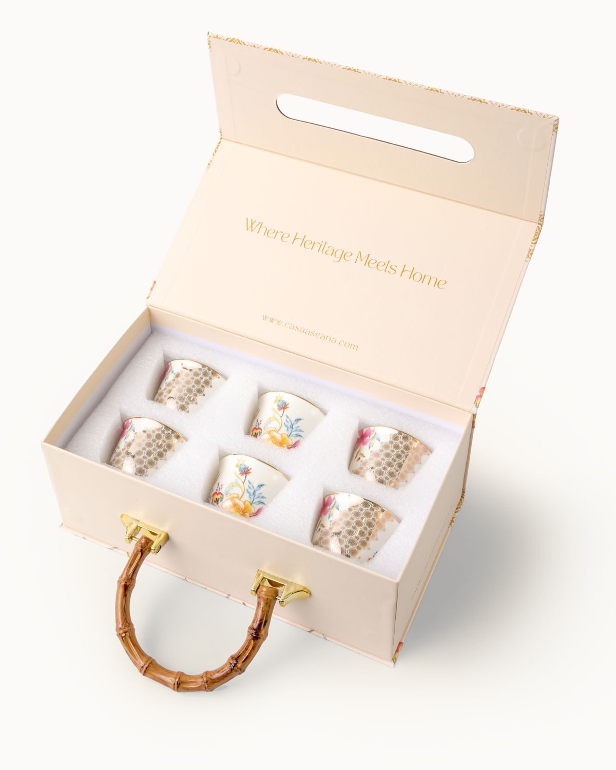Six Casa Aseana small cups in an open gift box with bamboo handle
