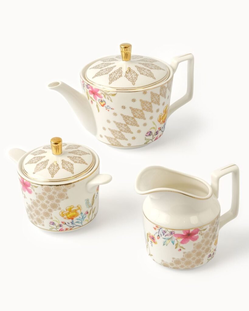 Casa Aseana fine porcelain teapot, sugar bowl and creamer with gold detailing