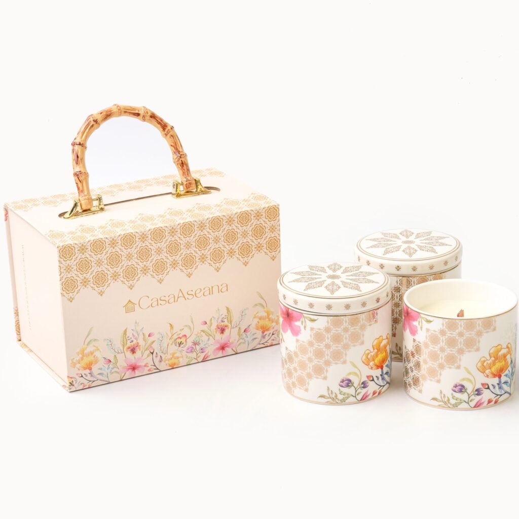 Casa Aseana cream gift box patterned in gold and florals, with a bamboo handle
