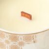 Close-up of the candle wax and wooden wick in a Casa Aseana Porcelain Candle