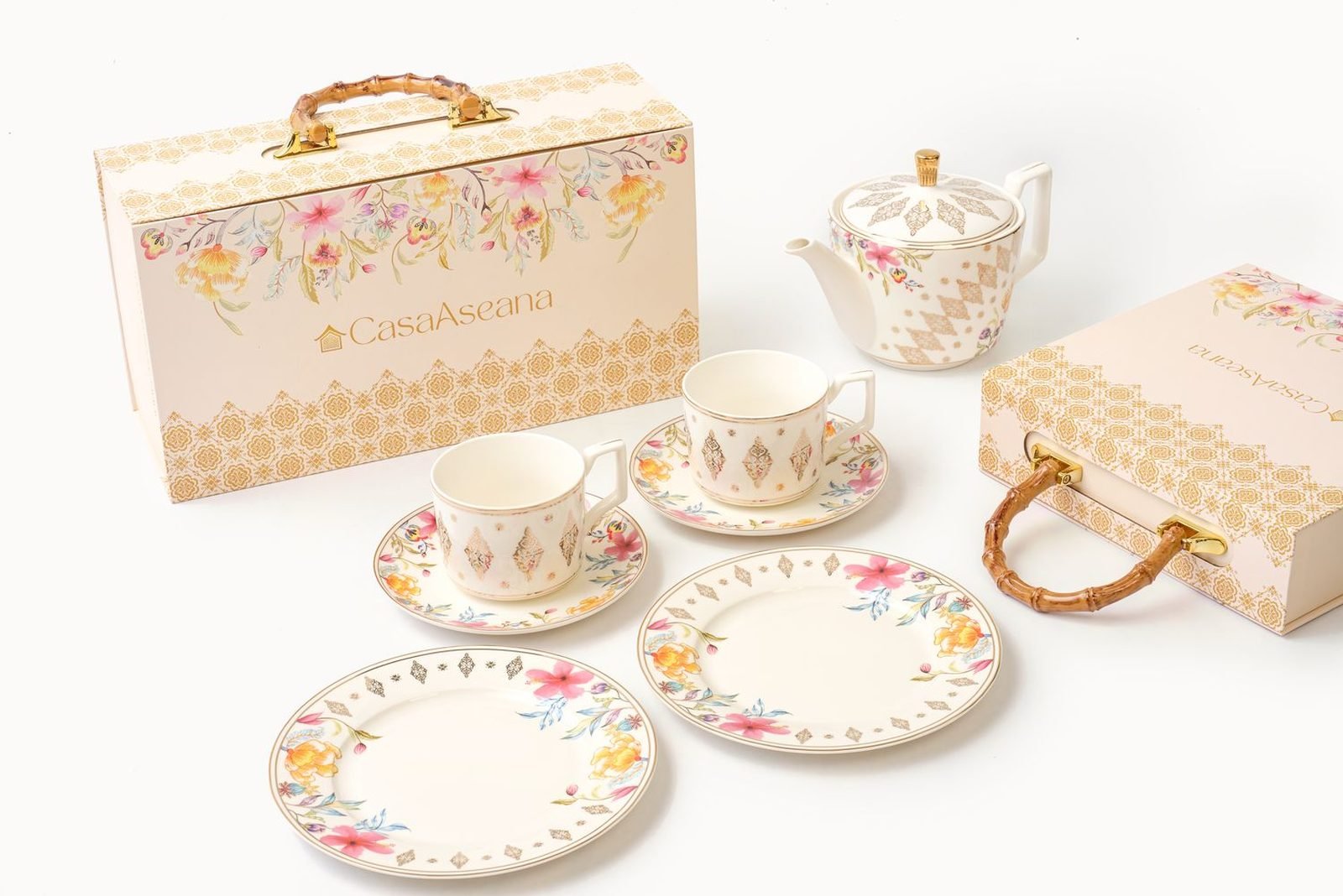 Casa Aseana Teapot Set beside Casa Aseana gift boxes with bamboo handles
